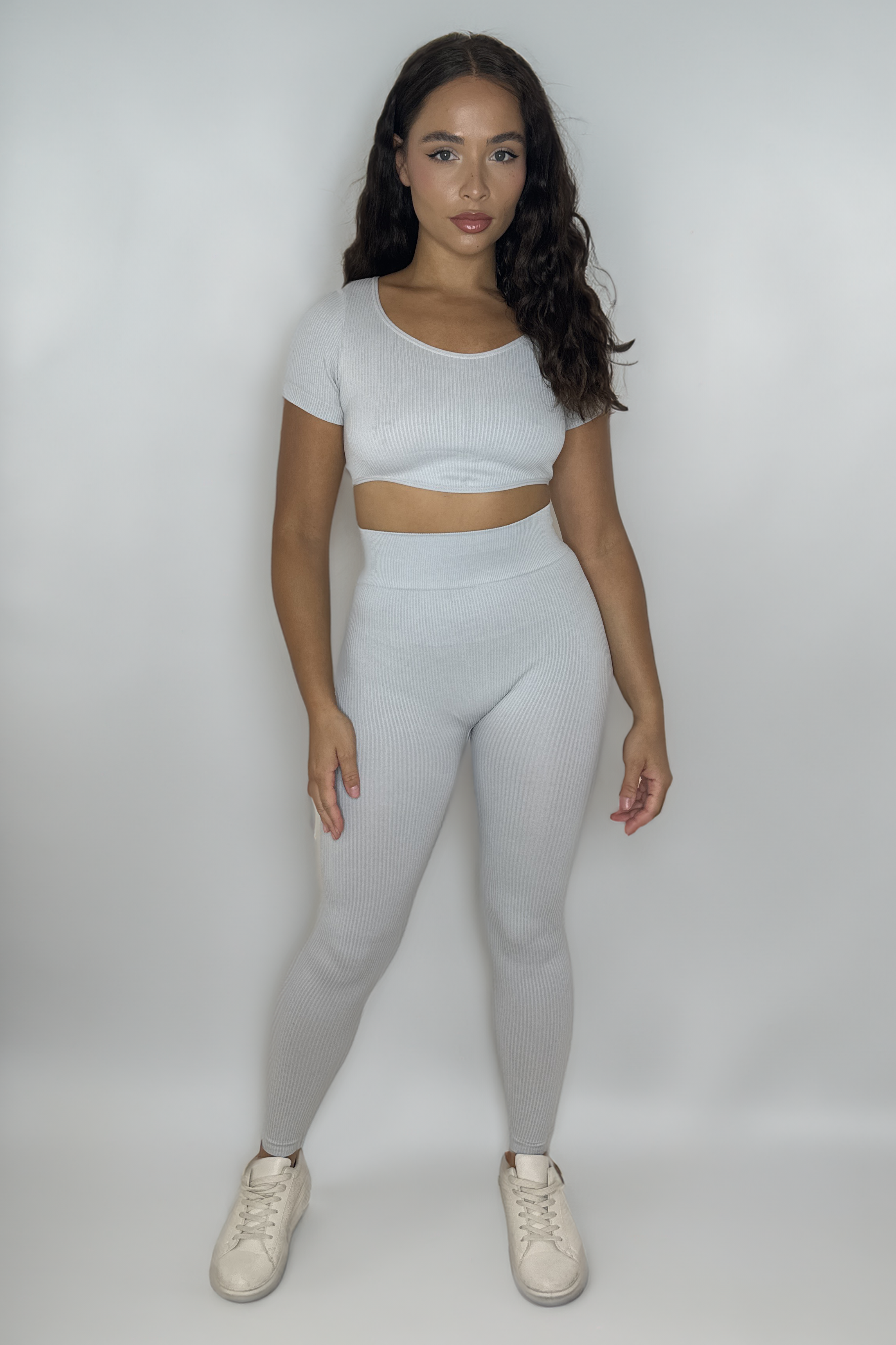Wholesale Women's Ribbed Stretchy Short Sleeve Asymmetric Crop Top And Leggings Activewear Set (PACK OF 6)