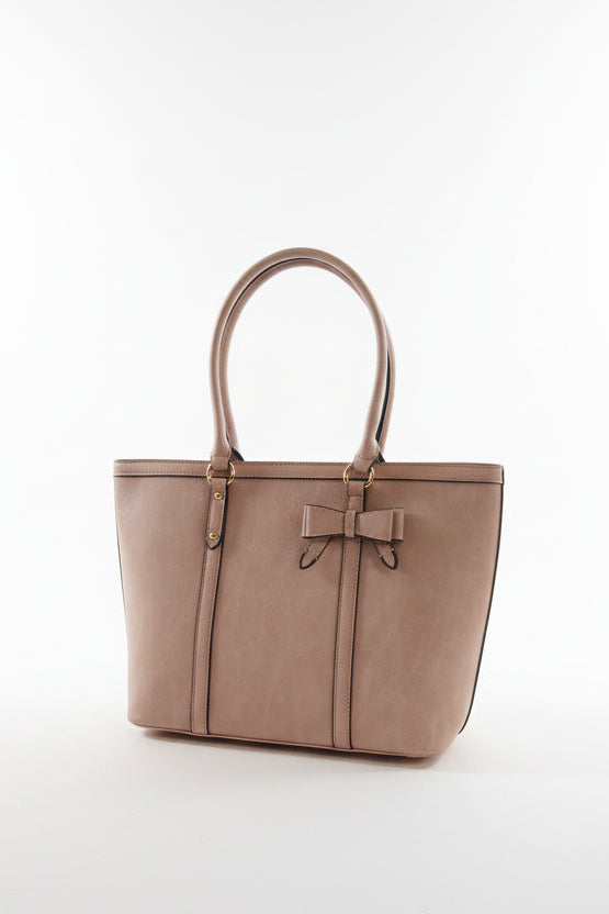 Beige handbag with a bow on a white background