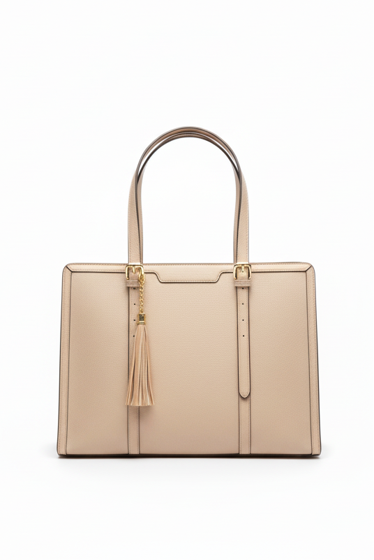 Beige handbag with a tassel on a white background