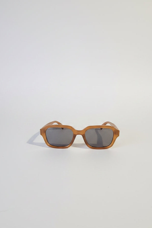 Brown sunglasses on a white background