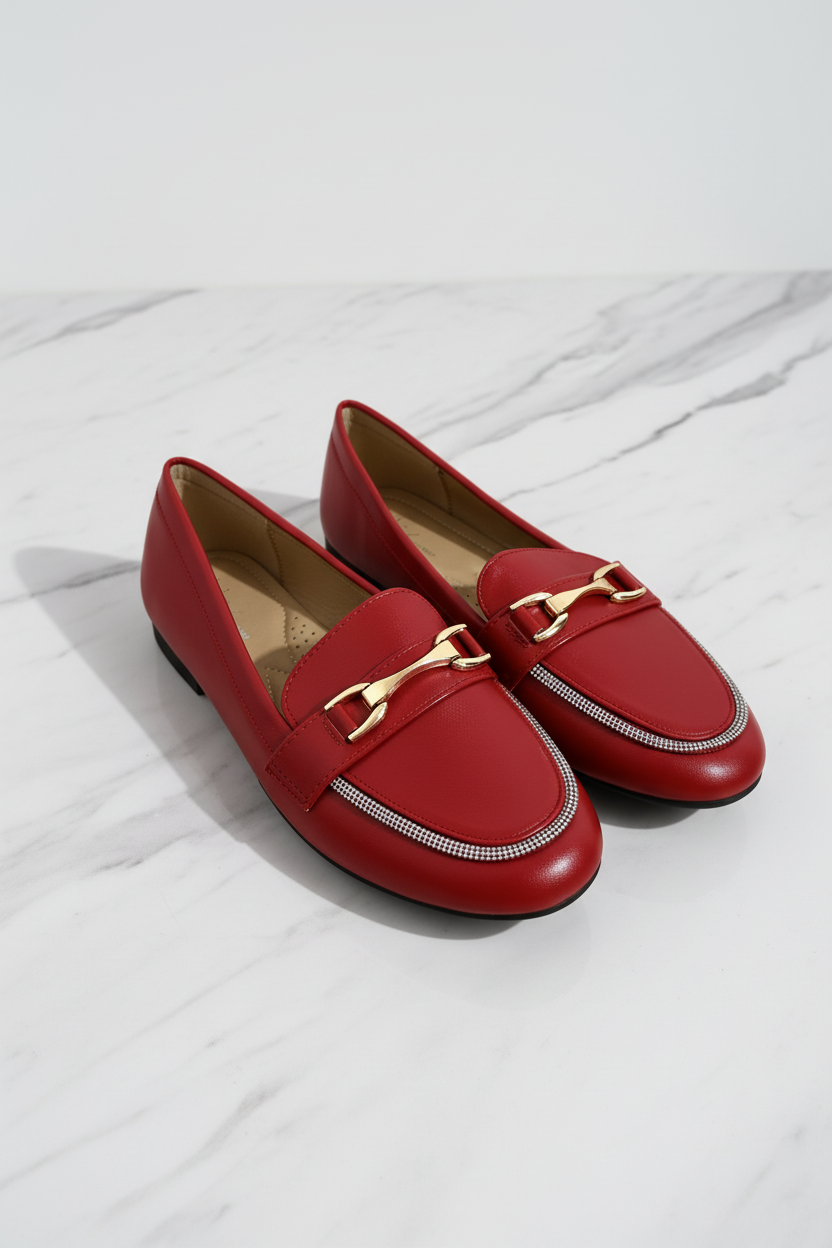 A pair of brown flat shoes with vegan leather encrusted trim.