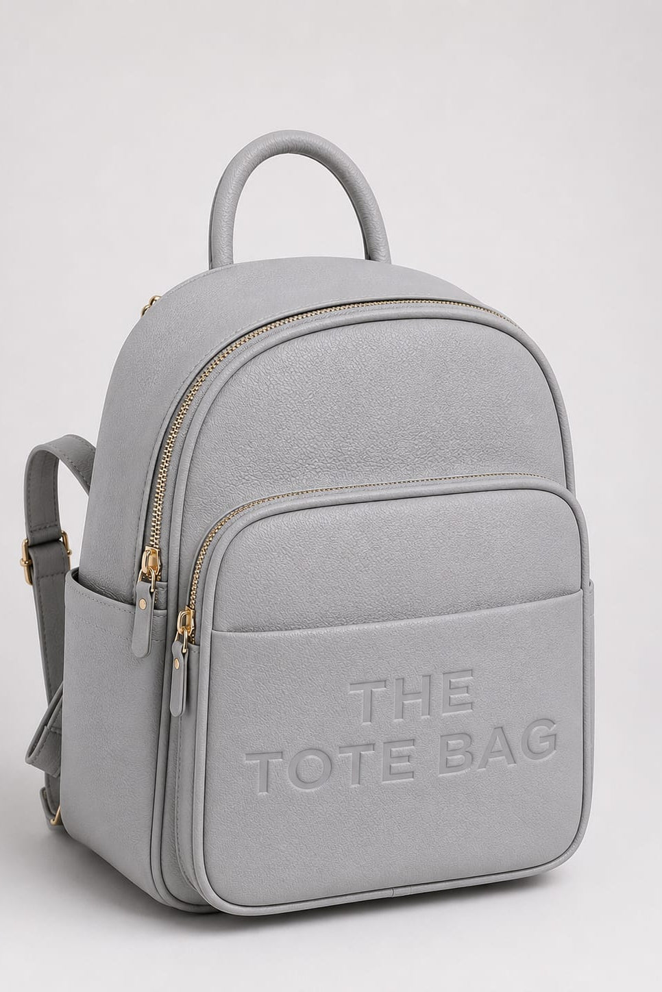 Premium Vegan Leather Embossed The Tote Bag Backpack