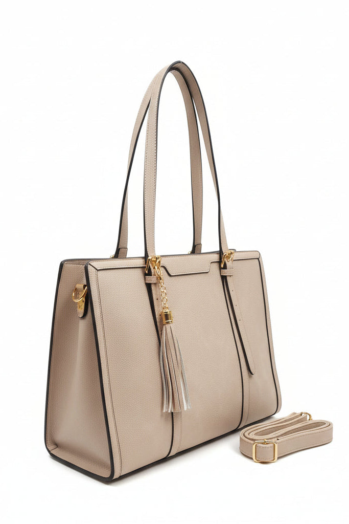 Beige handbag with a strap on a white background